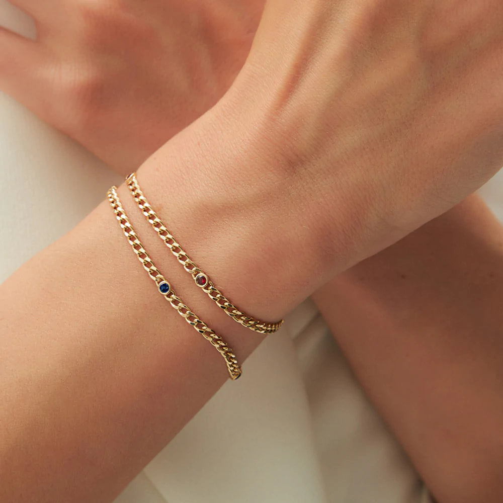 Solid Gold Cuban Link Bracelet with Sapphires