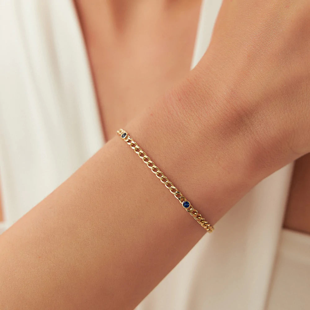 Solid Gold Cuban Link Bracelet with Sapphires