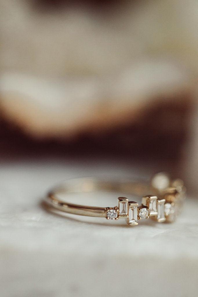 Solid Gold Stepped Baguette and Round Diamond Pattern Band