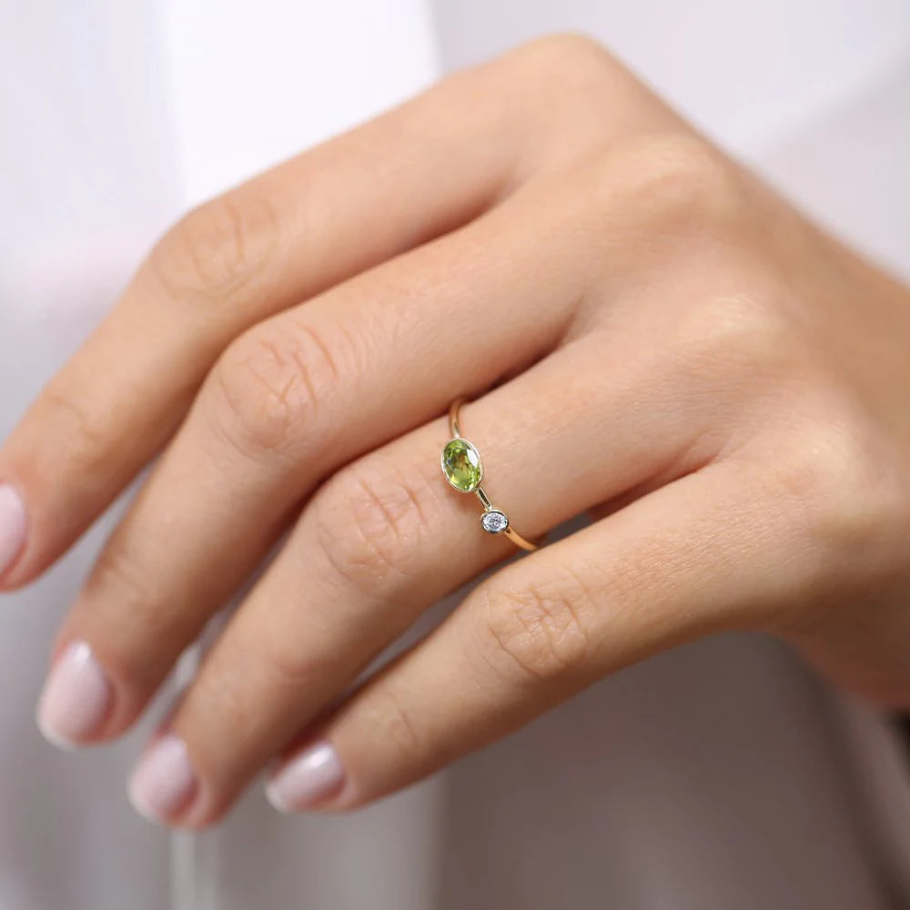 Solid Gold Oval Peridot and Diamond Ring