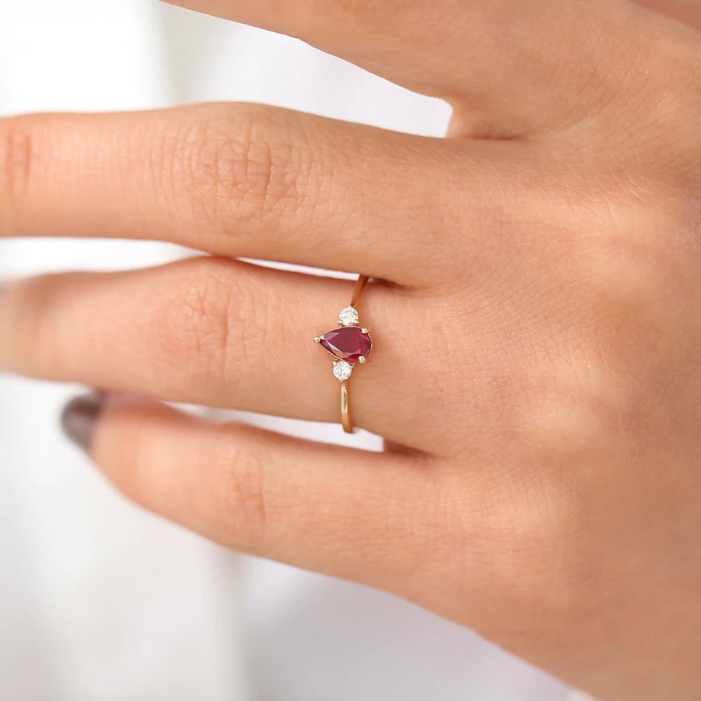 Solid Gold Pear Shape Ruby Ring with Diamonds