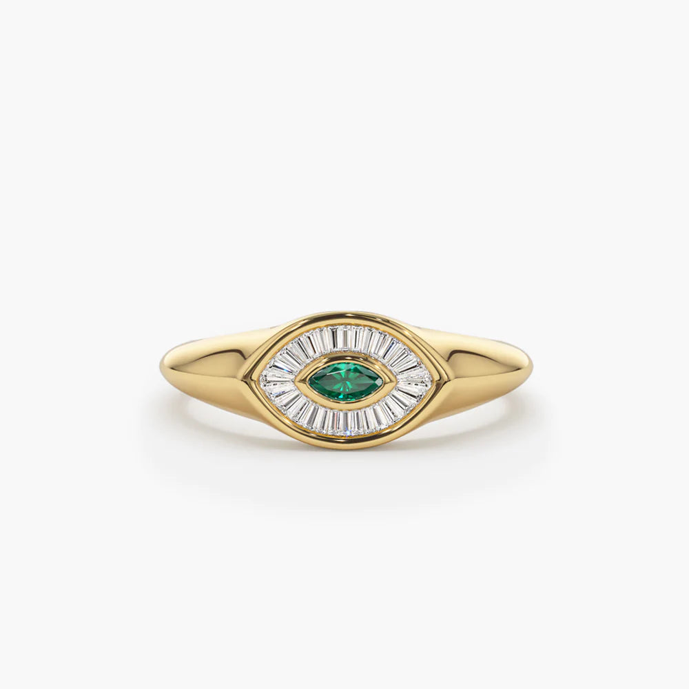 Solid Gold Marquise Shaped Emerald and Baguette Diamond Ring