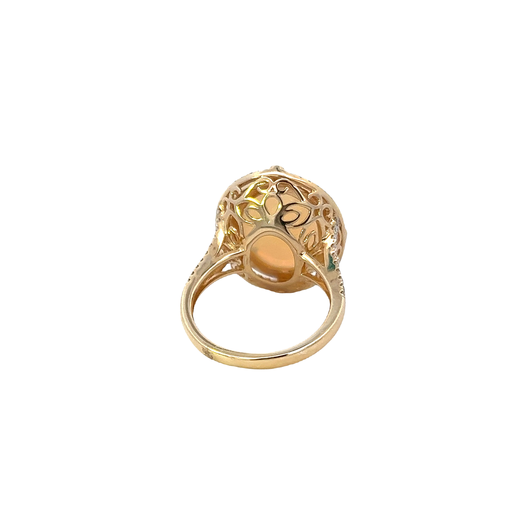 Solid Gold Large Oval Opal Set With Double Halo Ring