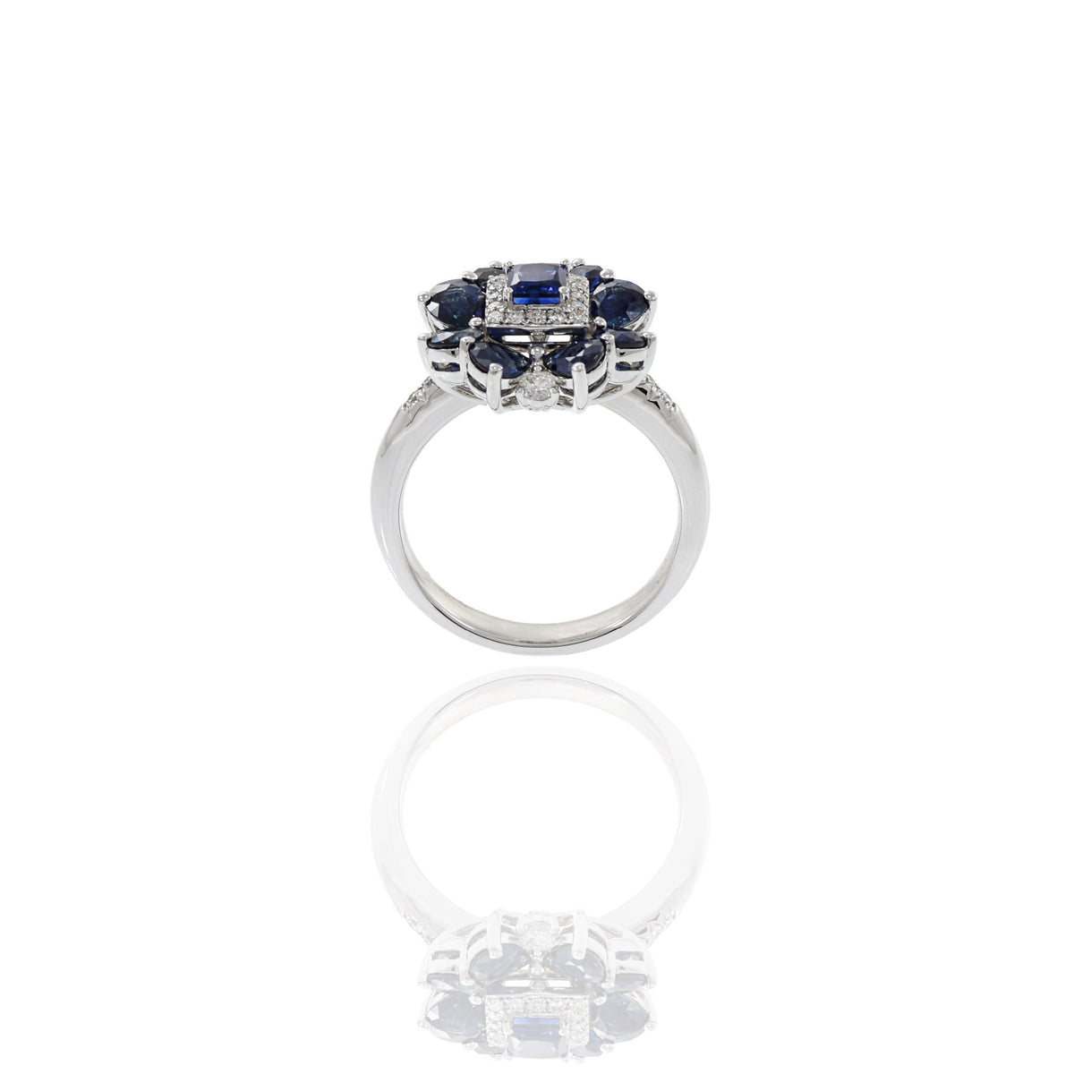 Solid Gold Blue Sapphire And Flower Diamond Ring
