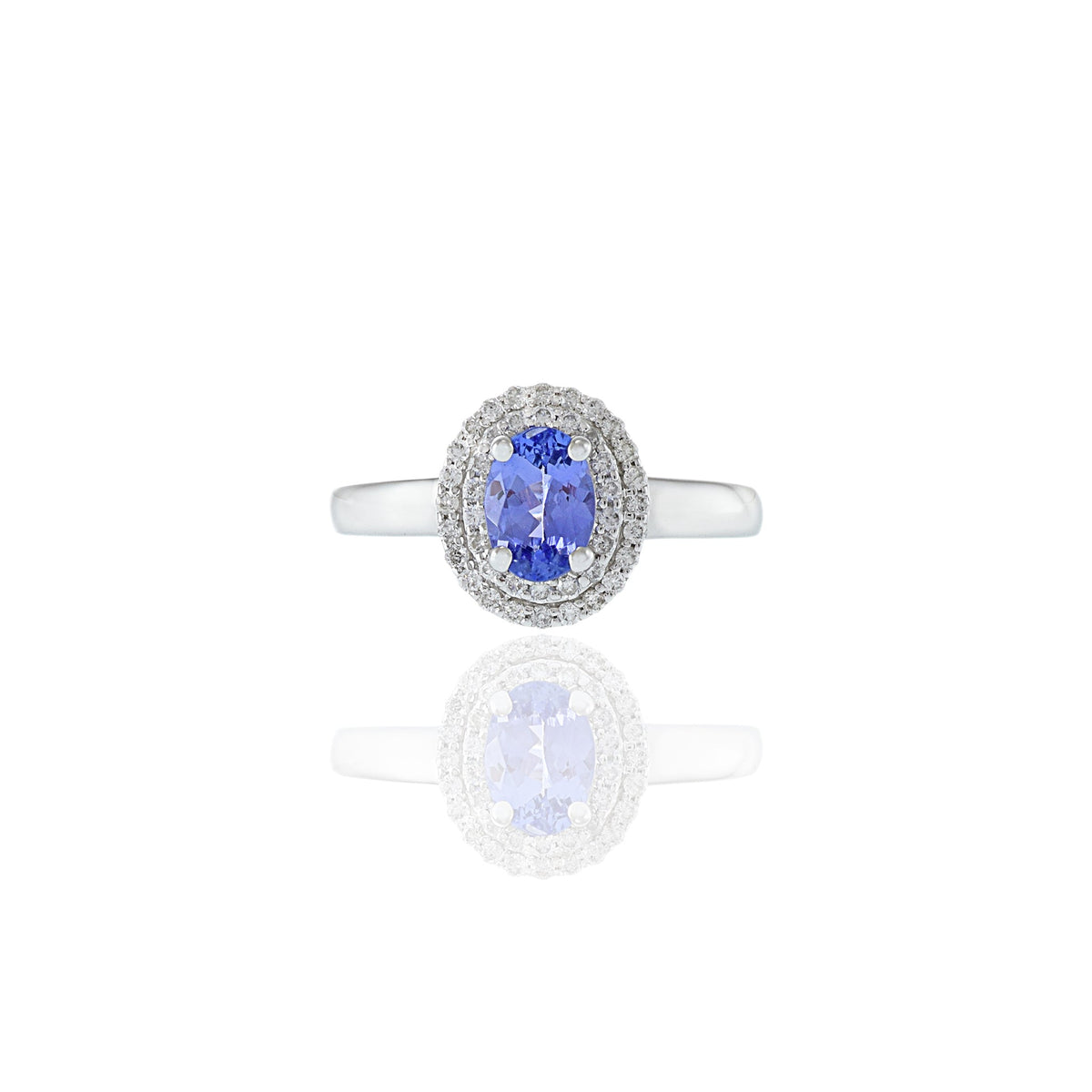 Solid Gold Oval Tanzanite And Diamond Halo Ring
