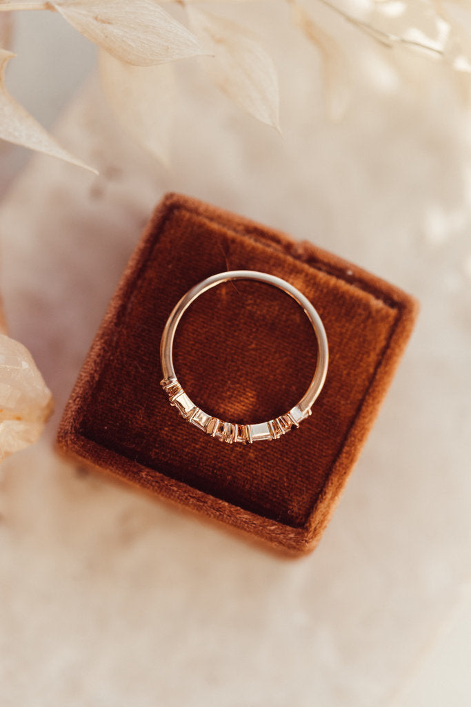 Solid Gold Scattered Tapered Baguette Diamond Band