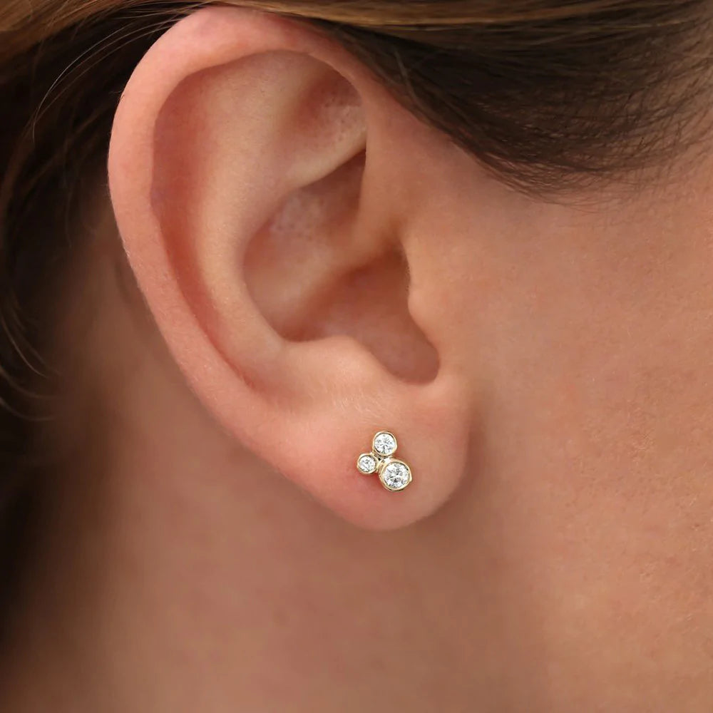 Solid Gold Graduated Diamond Stud Earrings