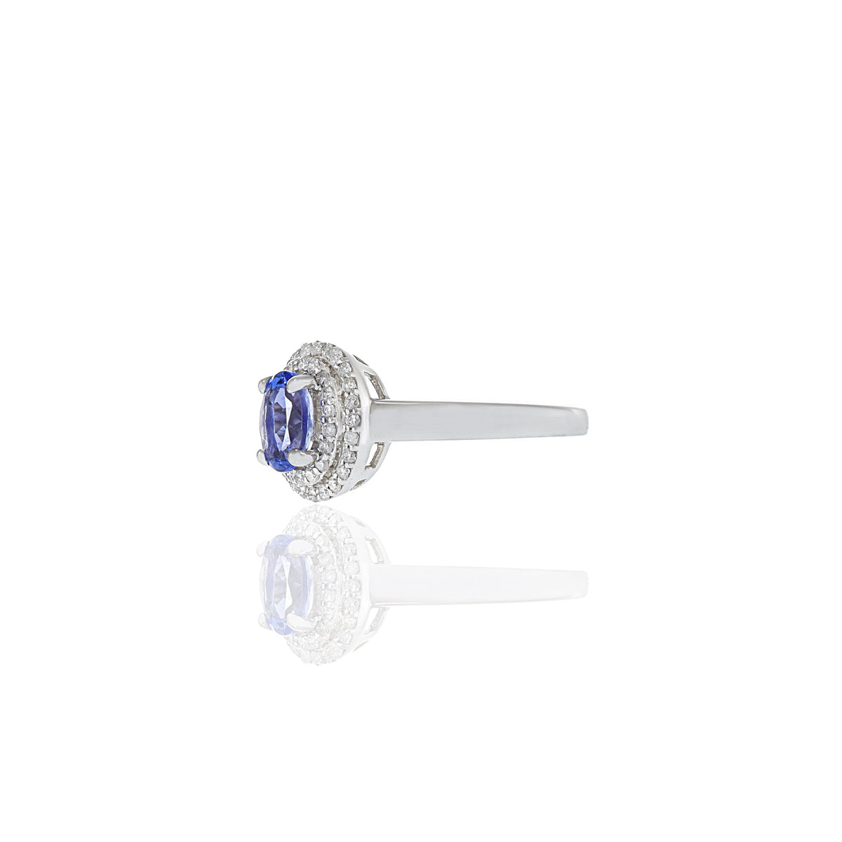 Solid Gold Oval Tanzanite And Diamond Halo Ring