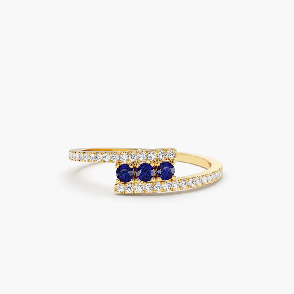 Solid Gold Cross Over Diamond Ring with Round Blue Sapphires