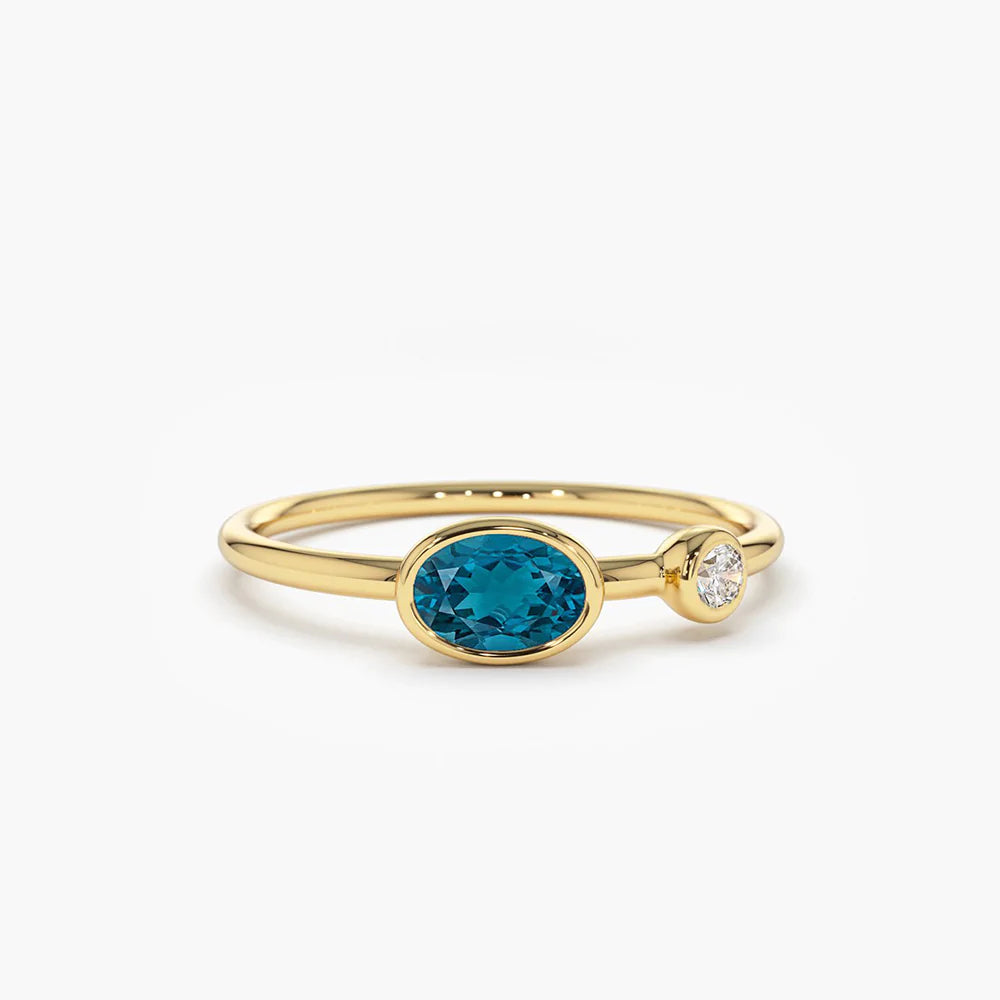 Solid Gold Oval London Blue Topaz and Diamond Ring