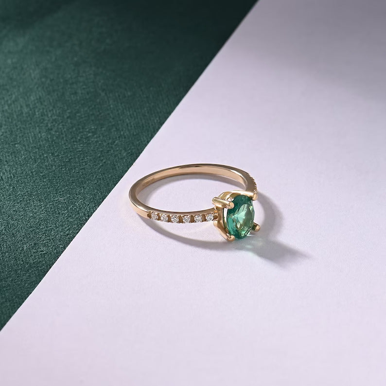 Solid Gold Emerald Oval Solitaire