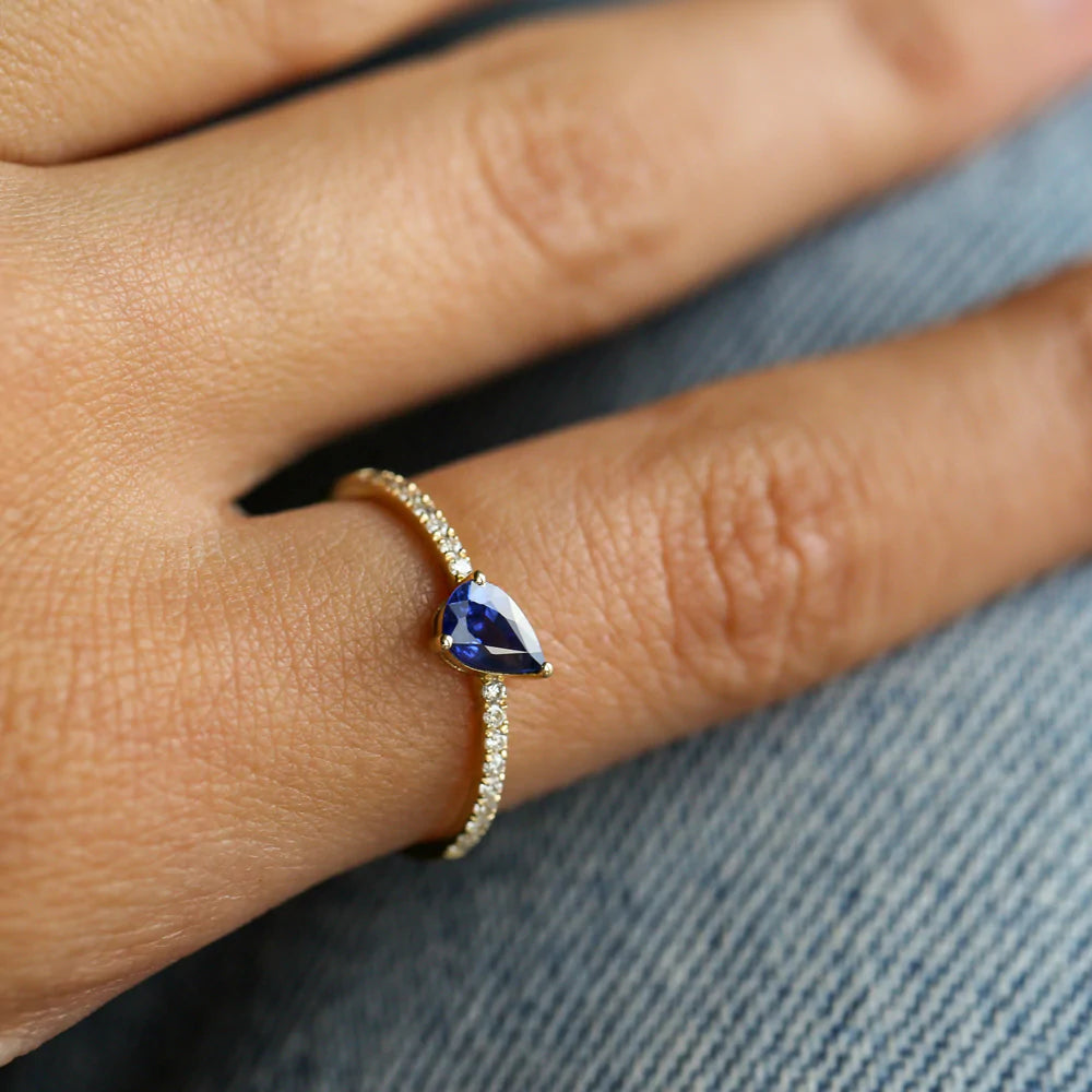 Solid Gold Slanted Pear Shape Sapphire Ring with Pave Diamonds