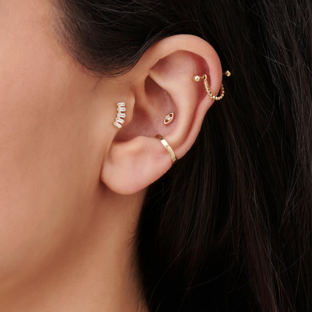 Solid Gold Curved Baguette Helix Piercing