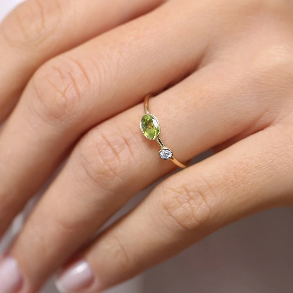Solid Gold Oval Peridot and Diamond Ring