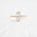 Unveiled Ring with Diamond Sweep, 1.05ct. Oval Cut Moissanite Diamond