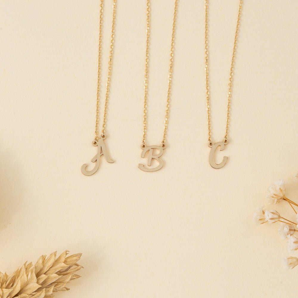 Solid Gold Cursive Initial Necklace (5D753A)