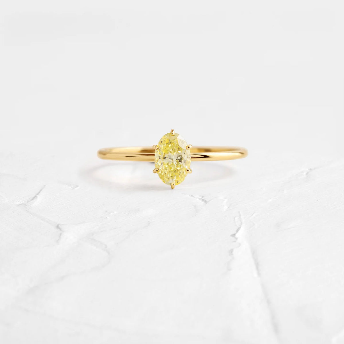 Solid Gold 0.64ct. Oval Cut Yellow Diamond Ring