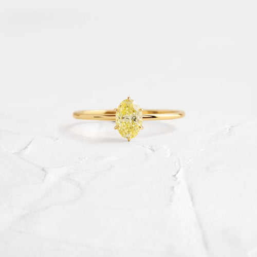 Solid Gold 0.64ct. Oval Cut Yellow Diamond Ring