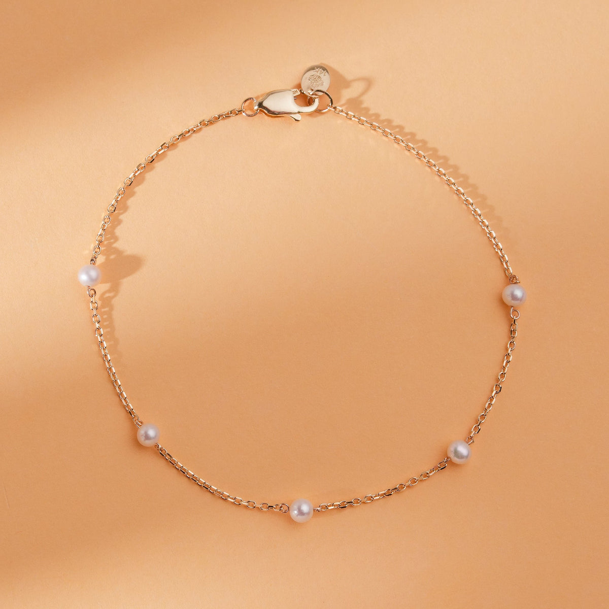 Solid Gold Pearl Station Bracelet