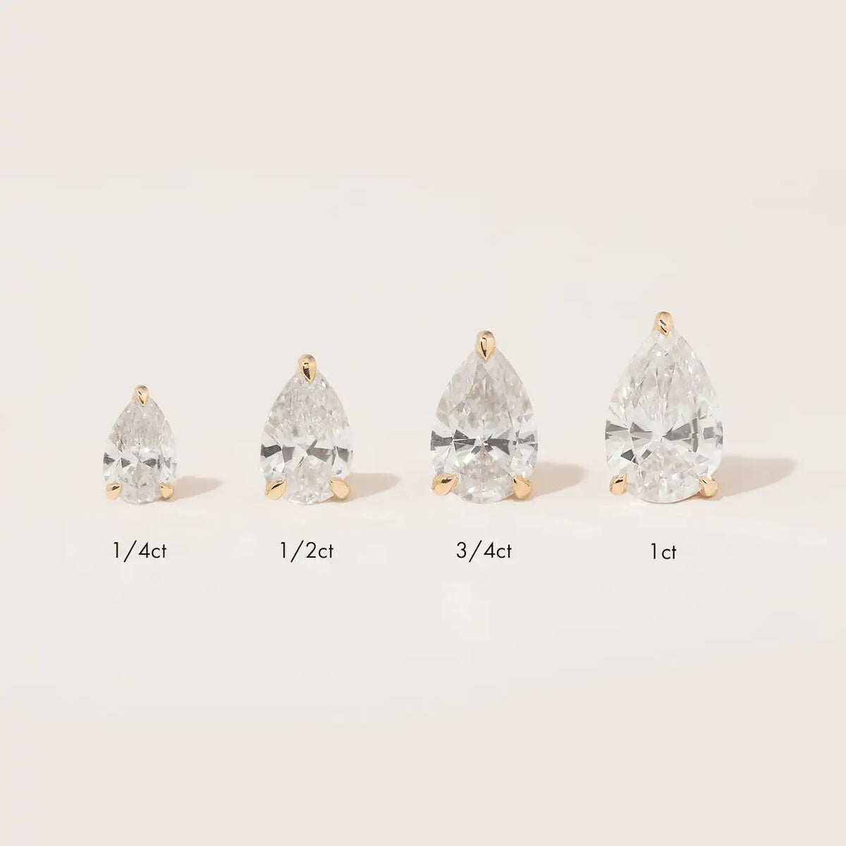 Solid Gold Pear Solitaire Studs , 1ct. Moissanite Diamond Studs