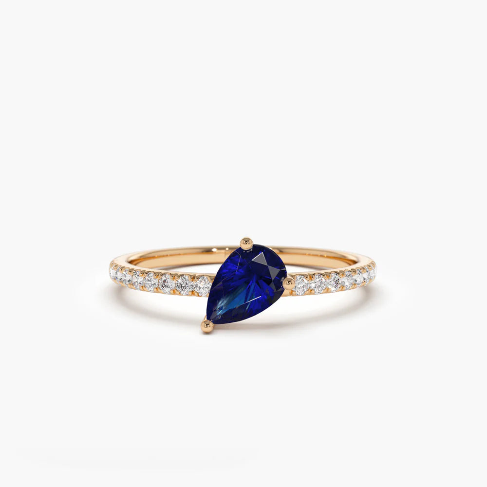 Solid Gold Slanted Pear Shape Sapphire Ring with Pave Diamonds