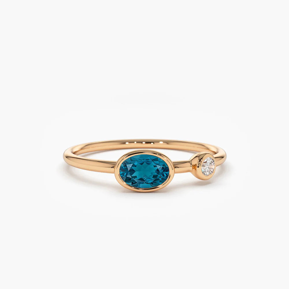 Solid Gold Oval London Blue Topaz and Diamond Ring