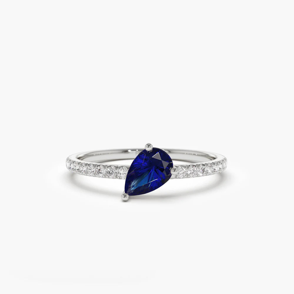 Solid Gold Slanted Pear Shape Sapphire Ring with Pave Diamonds