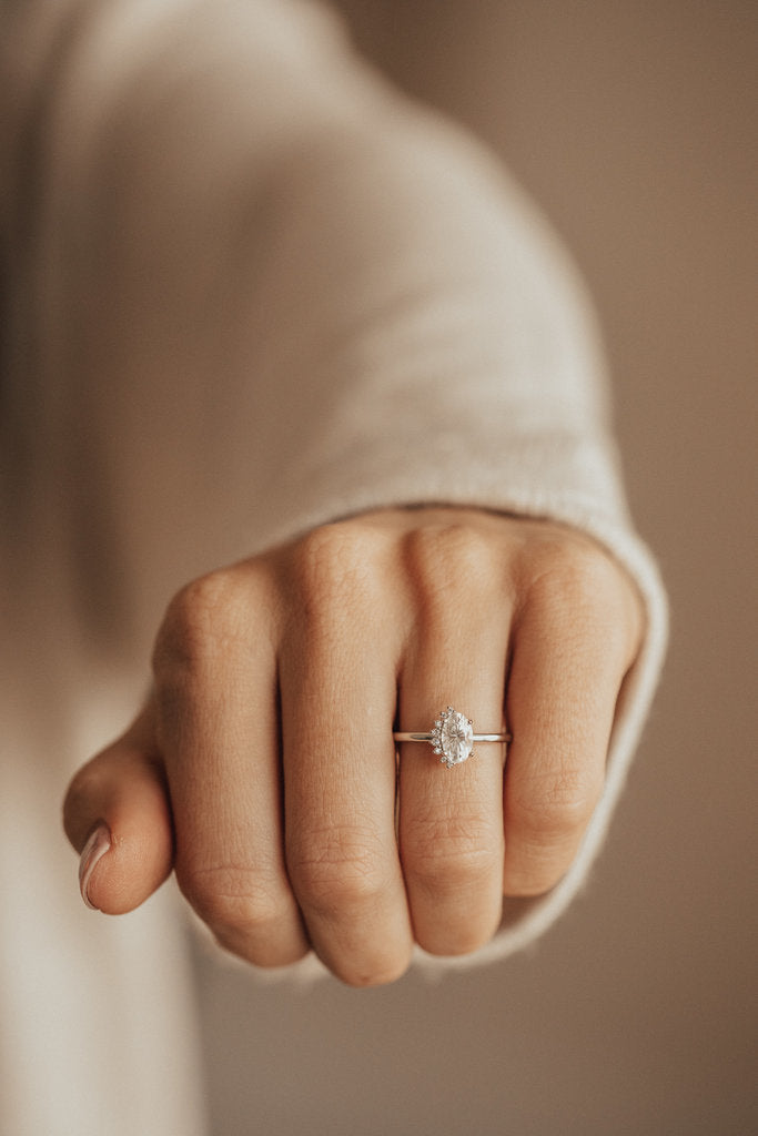 Solid Gold Oval Moissanite with .04 ct Side Flare Diamond Ring