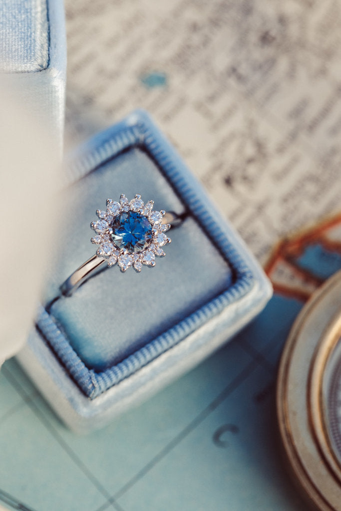 Solid Gold 0.84 ct Round Blue Montana Sapphire with 0.31 ct Halo Ring