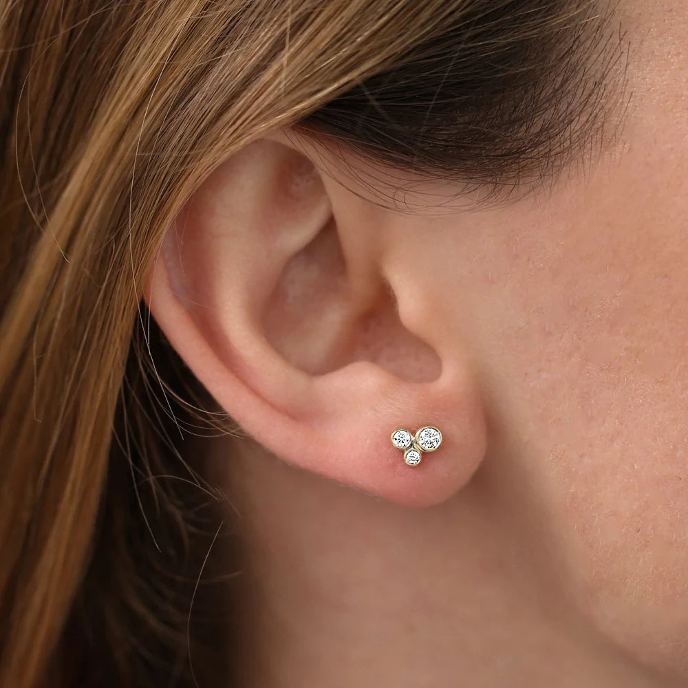 Solid Gold Graduated Diamond Stud Earrings