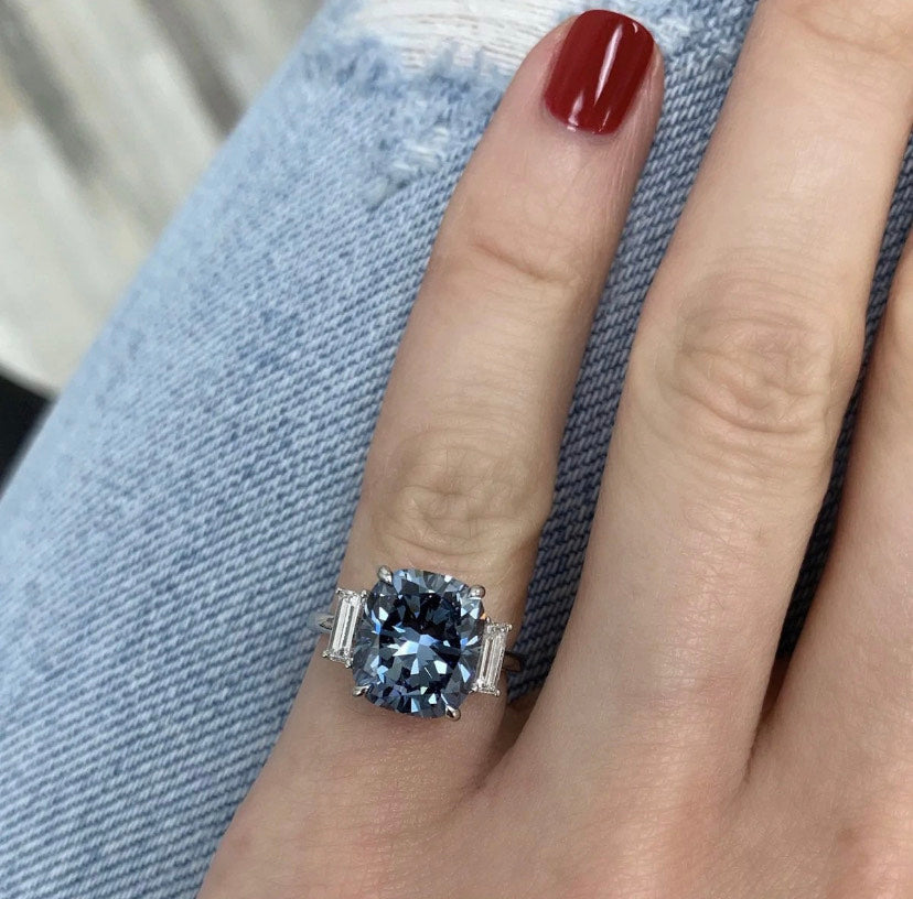 Blue moissanite engagement ring in solid 14ct gold