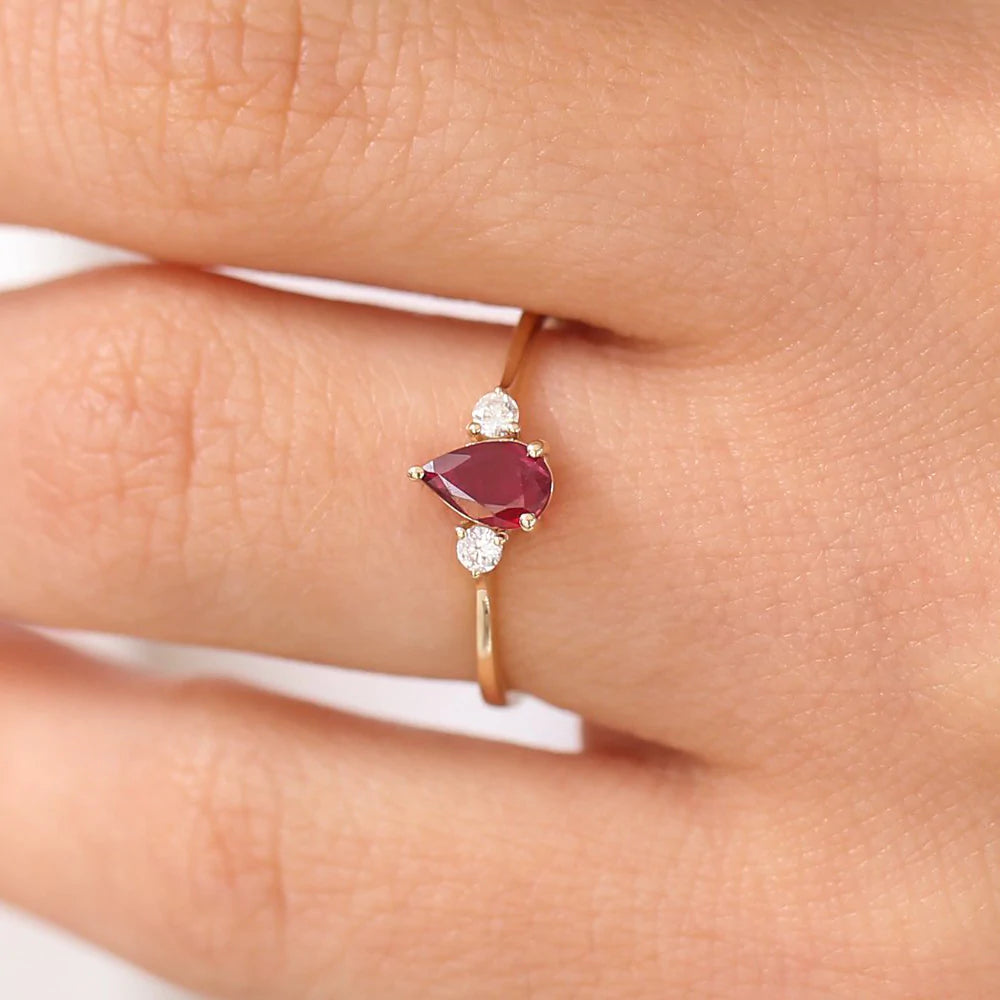 Solid Gold Pear Shape Ruby Ring with Diamonds