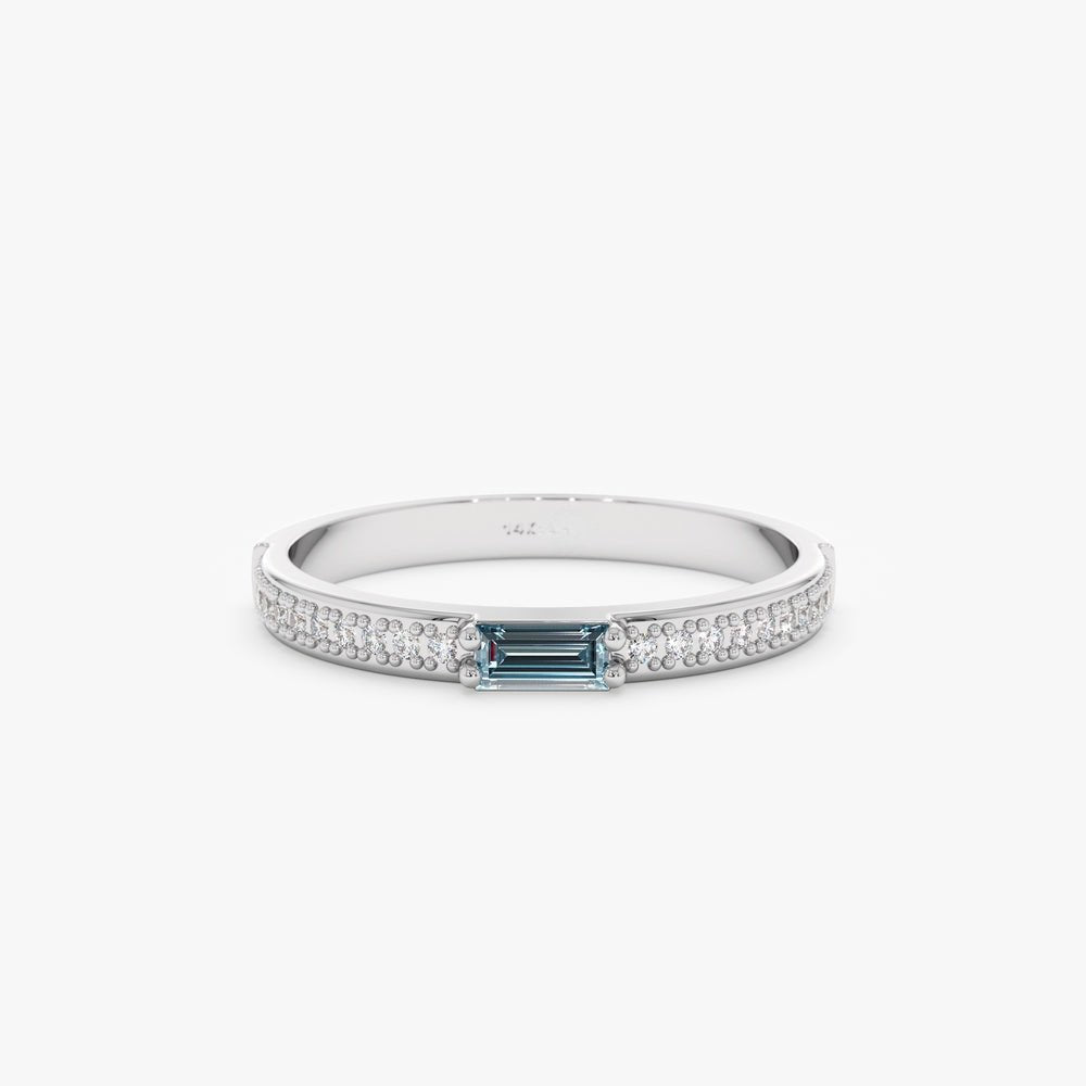 Solid Gold Diamond and Baguette Topaz Ring