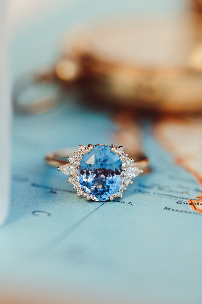 Stone Ring - The Atlantis 3.93 ct Oval Bright Blue Sapphire with .27 ct Side