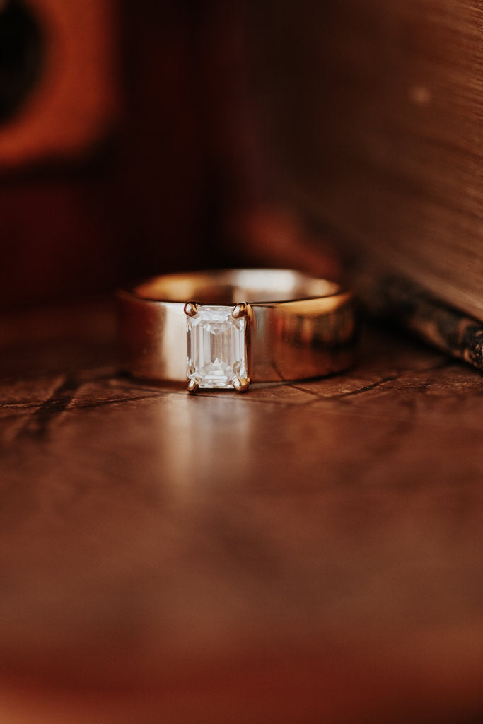 Solid Gold The Maya Emerald Cut Cigar Band Solitaire