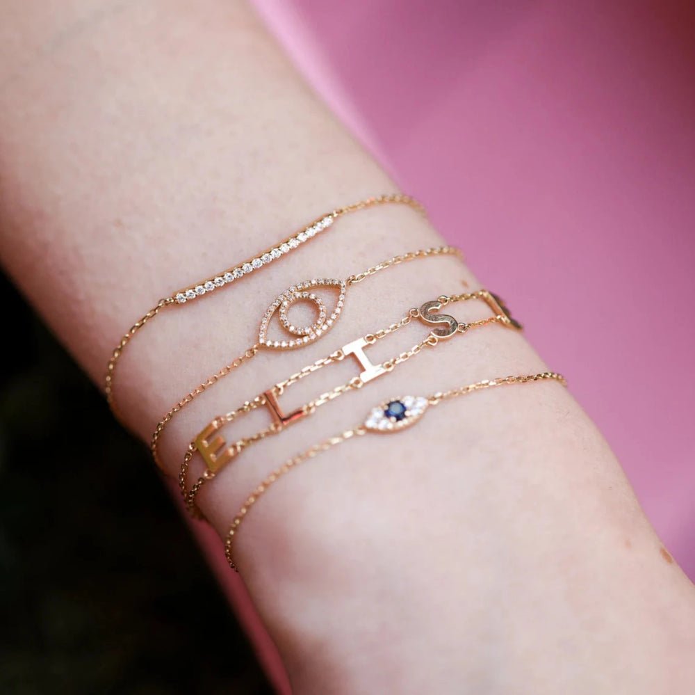 Solid Gold Diamond Eye Cutout Bracelet