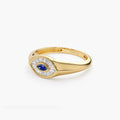 Solid Gold Marquise Shaped Sapphire and Baguette Diamond Ring
