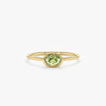 In Solid Gold Oval Peridot Ring