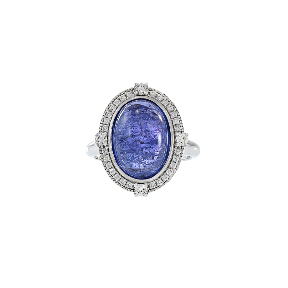 Solid Gold Oval Cabochon Tanzanite And Diamond Ring