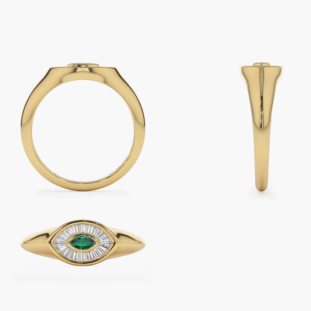 Solid Gold Marquise Shaped Emerald and Baguette Diamond Ring