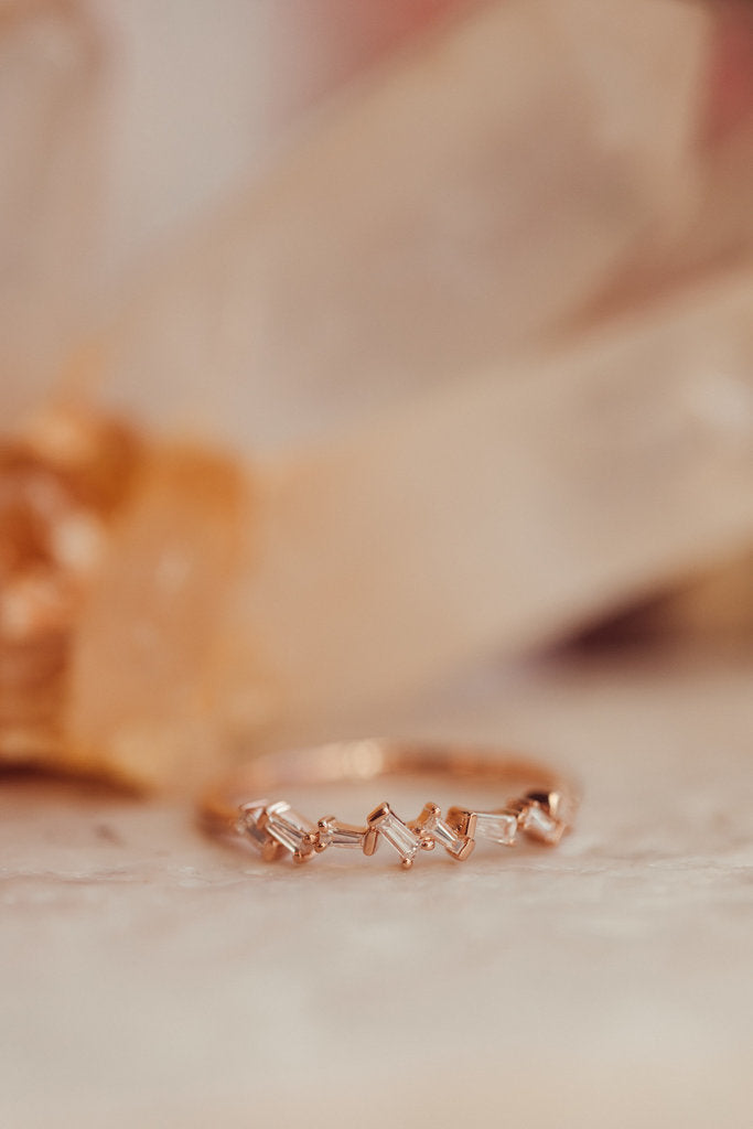 Solid Gold Scattered Tapered Baguette Diamond Band