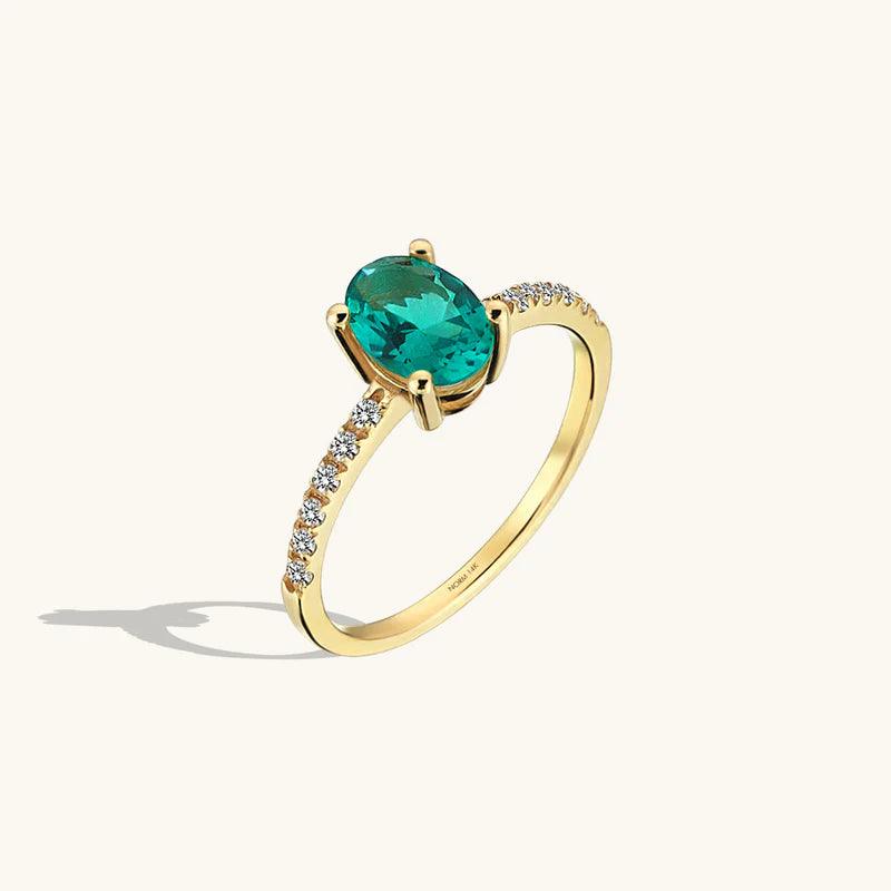 Solid Gold Emerald Oval Solitaire