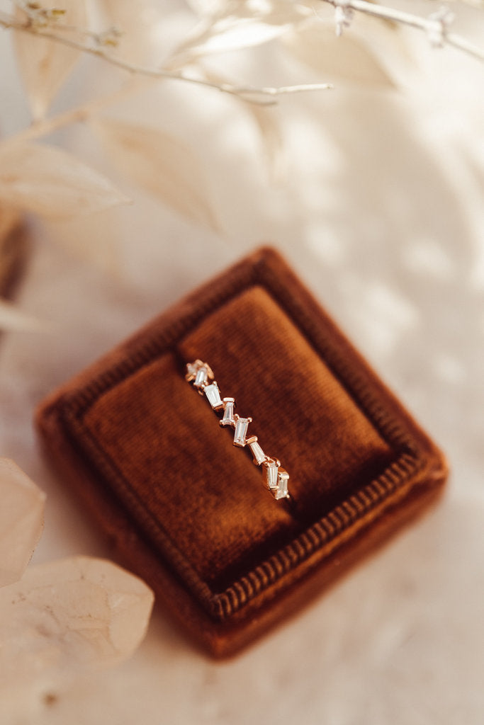 Solid Gold Scattered Tapered Baguette Diamond Band
