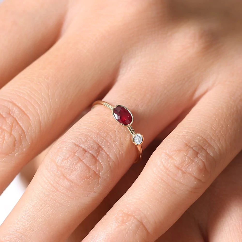 Solid Gold Oval Shape Bezel Setting Ruby and Diamond Ring