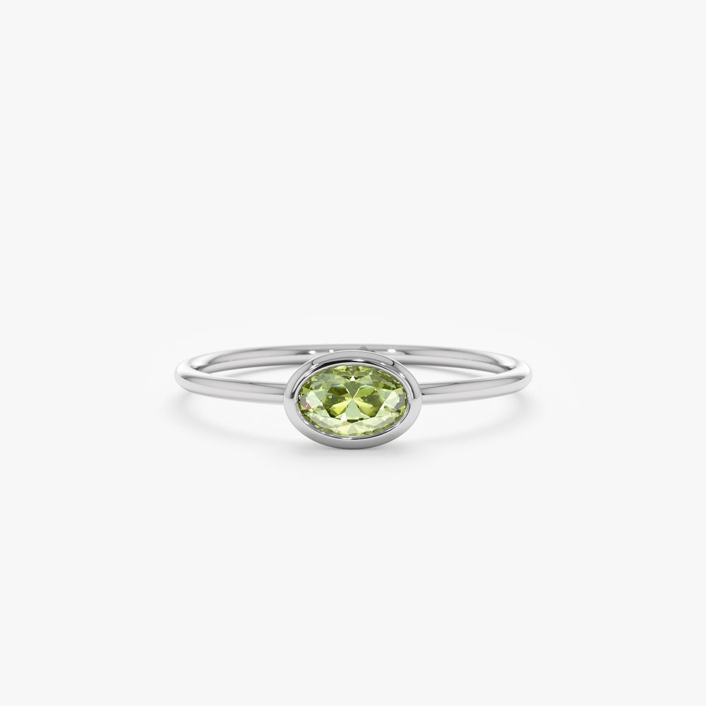 In Solid Gold Oval Peridot Ring