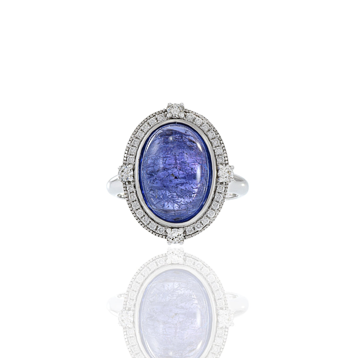 Solid Gold Oval Cabochon Tanzanite And Diamond Ring