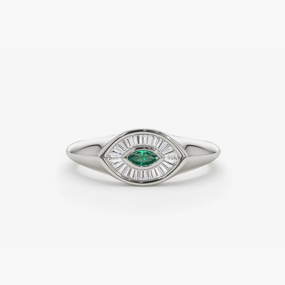 Solid Gold Marquise Shaped Emerald and Baguette Diamond Ring