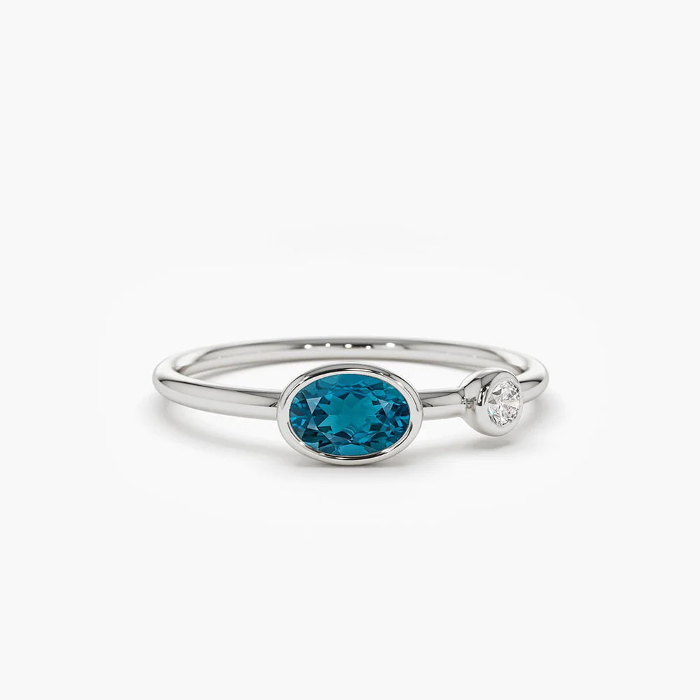Solid Gold Oval London Blue Topaz and Diamond Ring