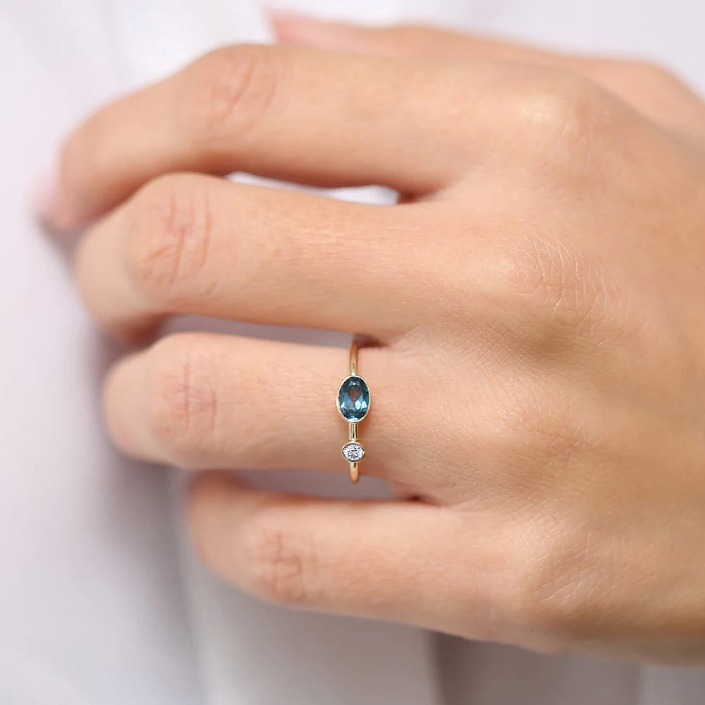 Solid Gold Oval London Blue Topaz and Diamond Ring