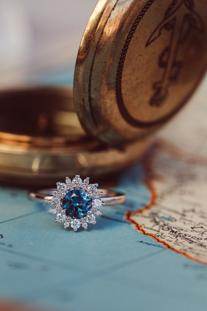 Solid Gold 0.84 ct Round Blue Montana Sapphire with 0.31 ct Halo Ring